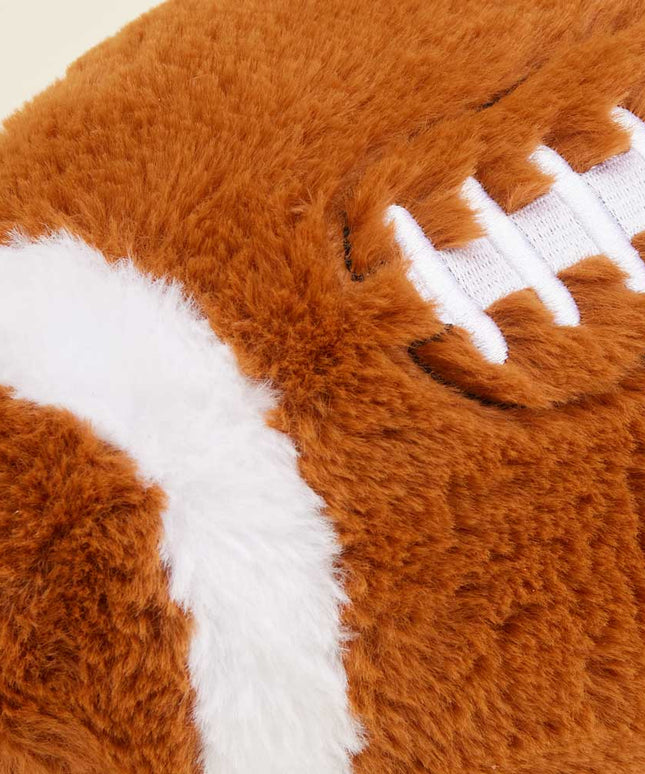 Plush football toy with brown and white colors on a white background