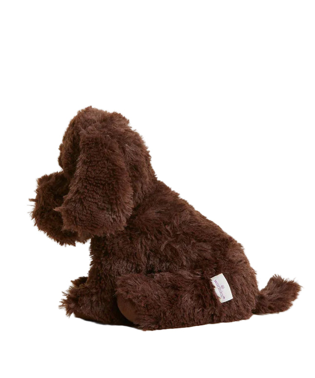 Brown plush dog toy on a white background