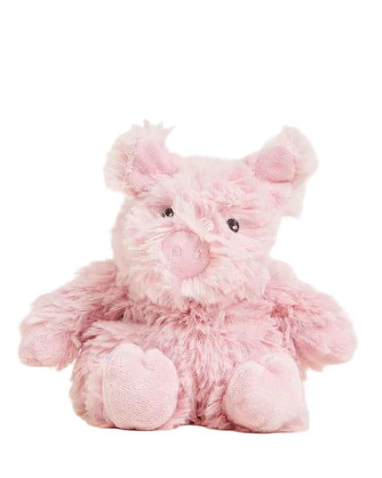 Pink plush pig toy on a white background
