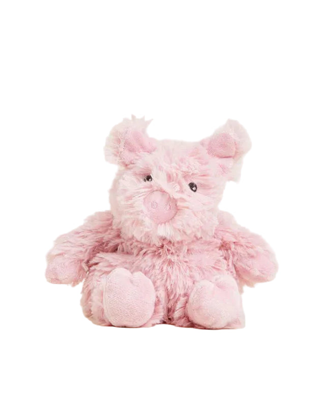 Pink plush pig toy on a white background