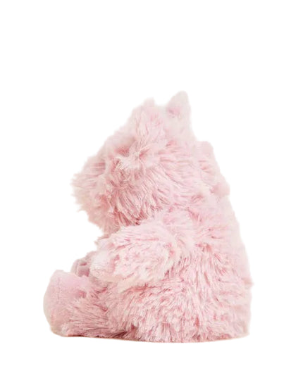Pink plush pig toy on a white background