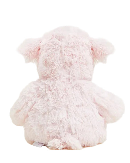 Pink plush pig toy on a white background