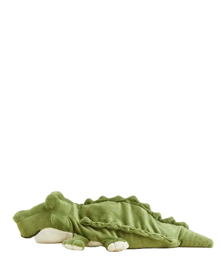Green dinosaur-shaped blanket on a white background