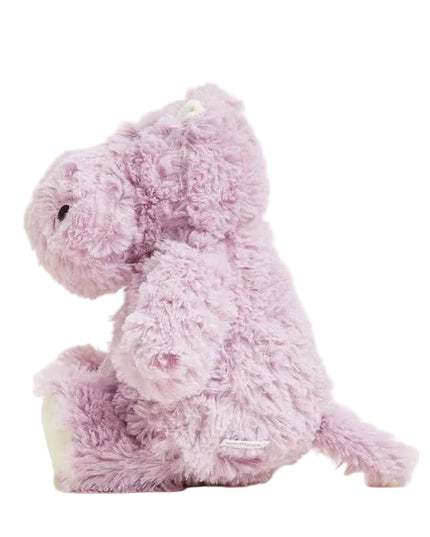 Pink plush toy on a light pink background