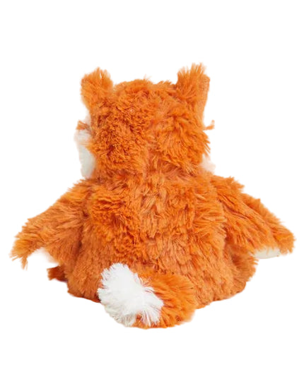 Orange plush toy with a white patch on a light beige background