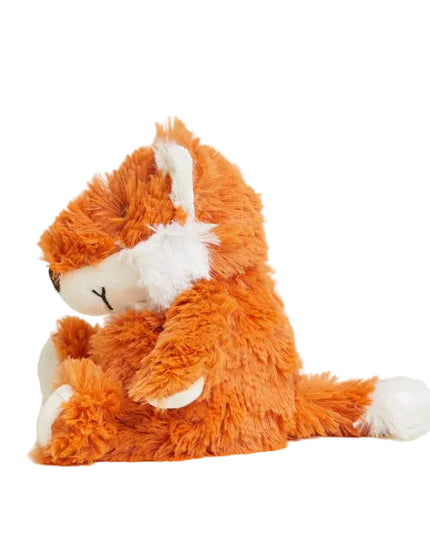 Plush fox toy on a light beige background