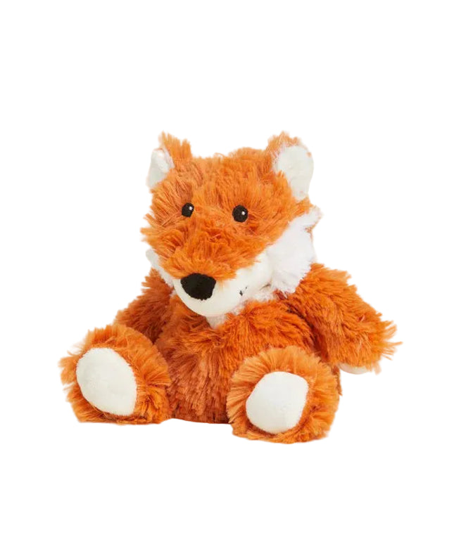 Plush fox toy on a light background