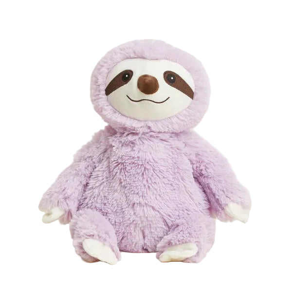 Plush toy sloth in a purple outfit on a light beige background