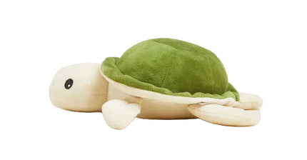 Plush turtle toy on a light beige background