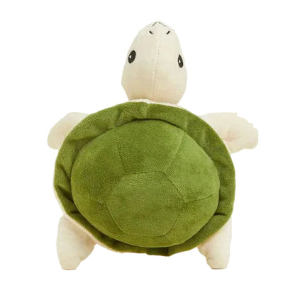 Plush turtle toy with a green shell on a white background