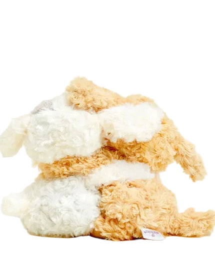 Two plush dogs, one brown and one white with gray patches, on a white background.