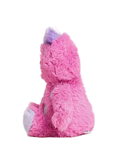 Pink plush toy with a purple horn on a light beige background