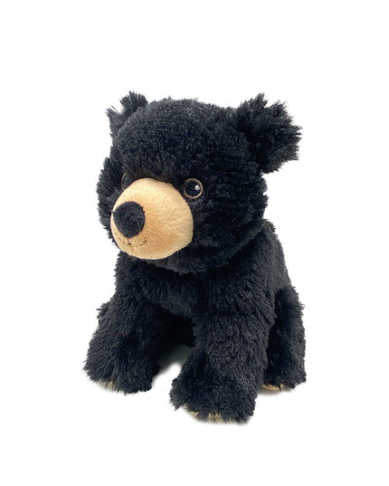 Black plush bear toy on a white background