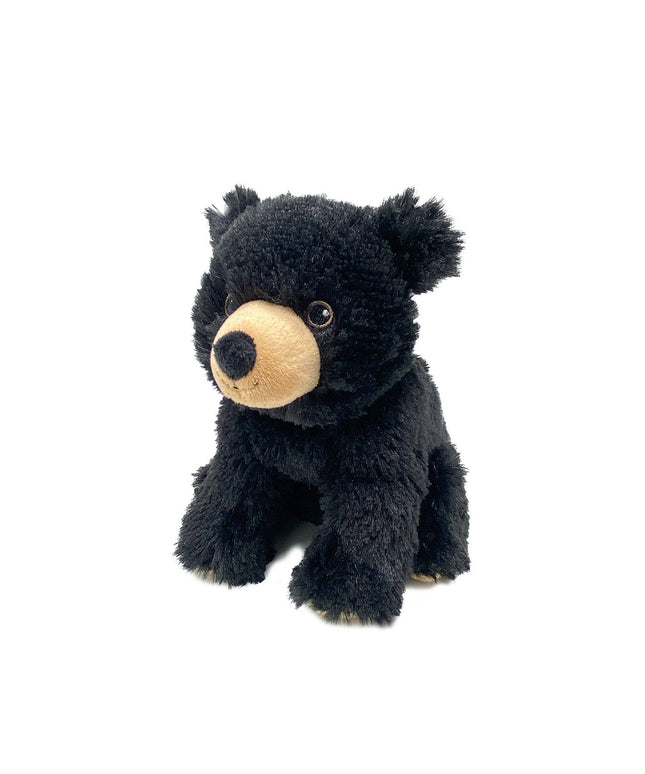 Black plush bear toy on a white background