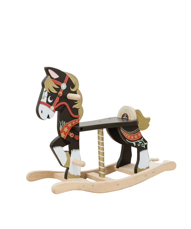 Wooden rocking horse with decorative elements on a wooden floor.