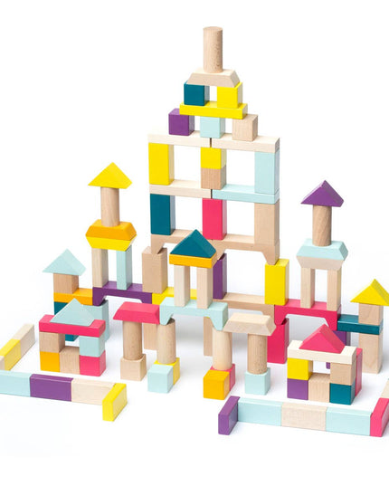 Colorful wooden building blocks stacked on a white background