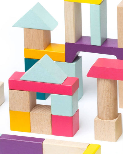 Colorful wooden building blocks on a white background