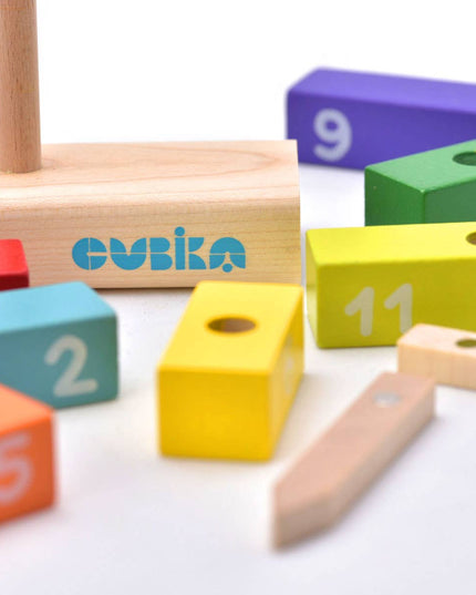 Colorful wooden blocks with numbers and a Cubika logo on a white background